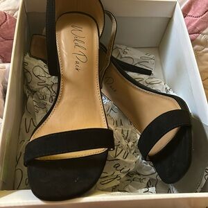 Brand new black strappy sandals size 9 wild pair is the brand